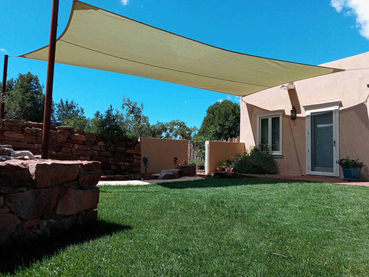 shade your back yard to keep cool