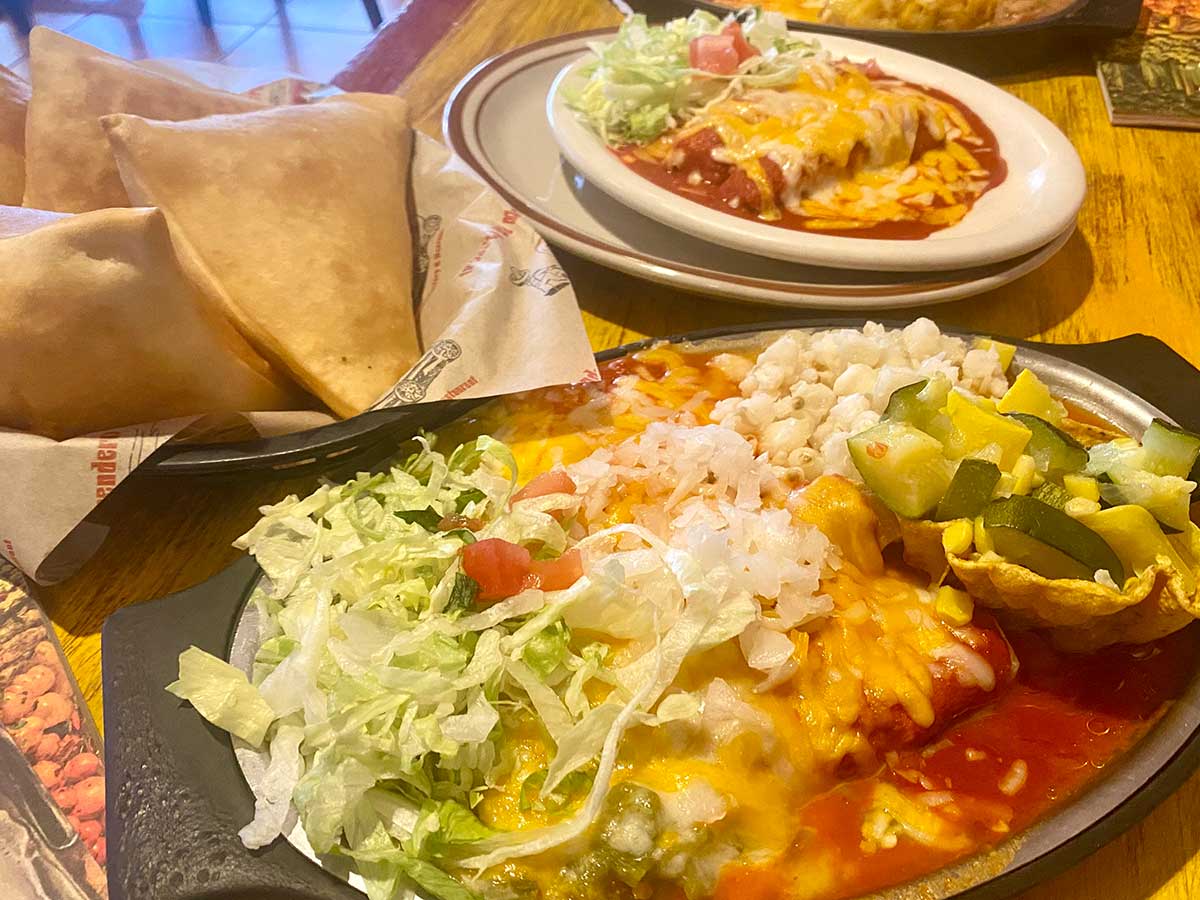 Enchiladas red & green, sopaipillas, and cheese tamale red at Posa's in Santa Fe, New Mexico