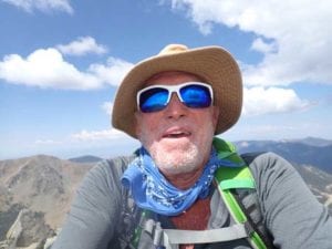 Rick Richards atop Wheeler Peak in the summer of 2020.