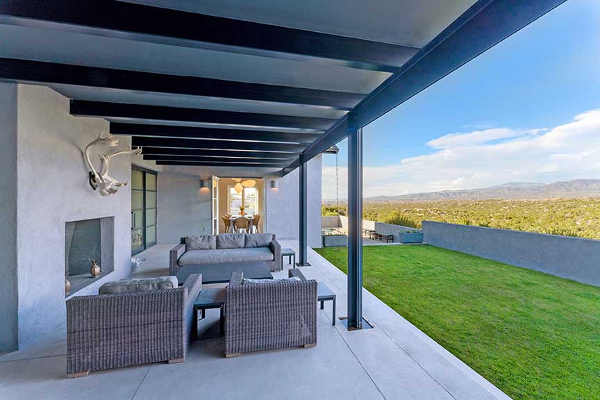 Luxury homes in Santa Fe include beautiful outdoor entertaining spaces. Photo courtesy Ricky Allen.