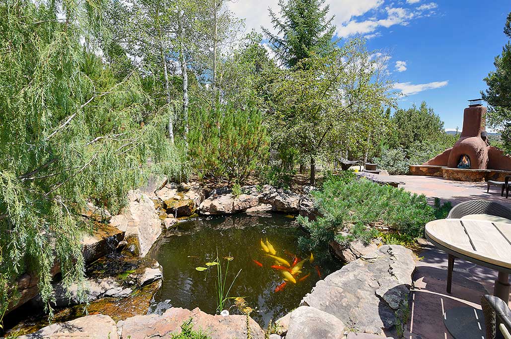 Luxury homes in Santa Fe may include a koi pond.