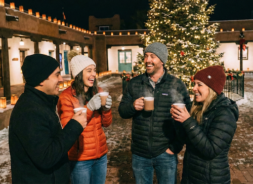 Friends enjoying cocoa near Palace of the Governors.